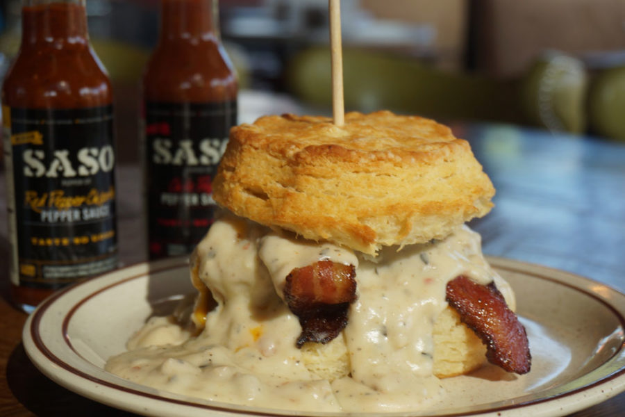 chicken biscuit with bacon drowning in gravy from denver biscuit company