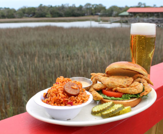 fried crab sandwich and side of seafood rice from fleet landing restaurant and bar in charleston