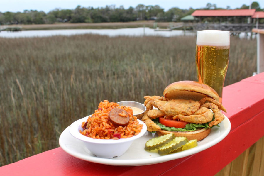 fried crab sandwich and side of seafood rice from fleet landing restaurant and bar in charleston