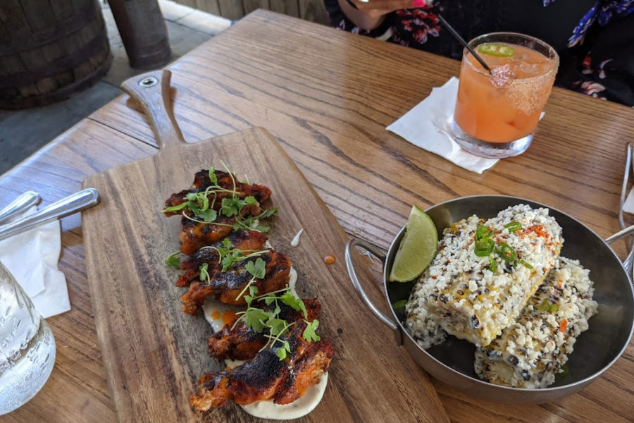 tacos, corn on the cobb, and cocktail from prohibition in charleston