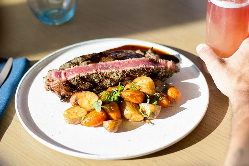 steak and potatoes with a handcrafted cocktail from SiX in Tampa