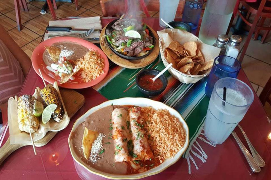 burritos, corn on the cob, and other mexican entrees from taqueria los potrillos in miami