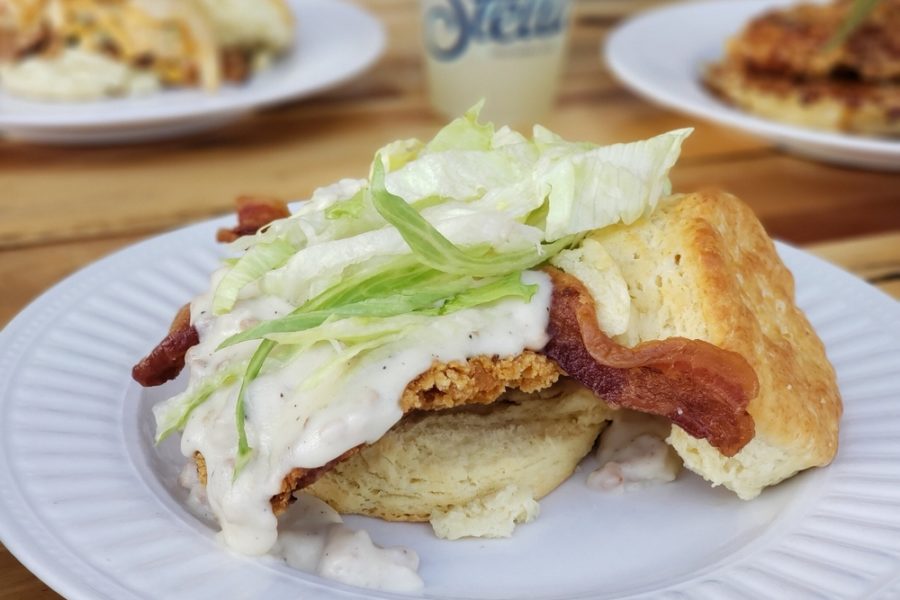 chicken biscuit with sauce, lettuce, and bacon from stella southern cafe in college station