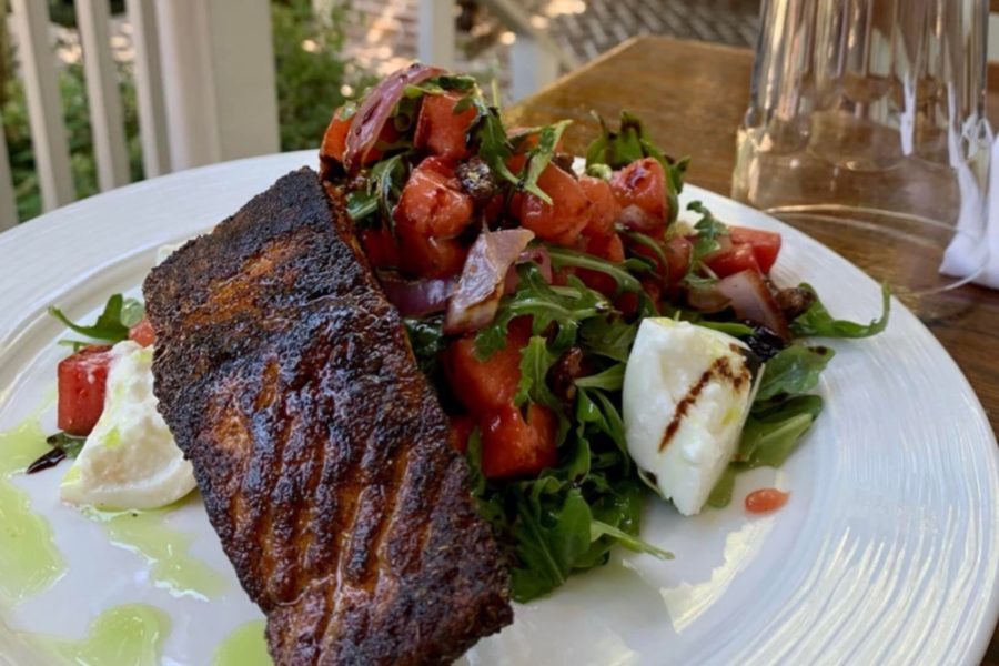 fish dinner and side salad from cru cafe in charleston