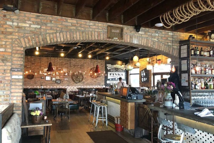 indoor dining and bar at FINKA table and tap in miami