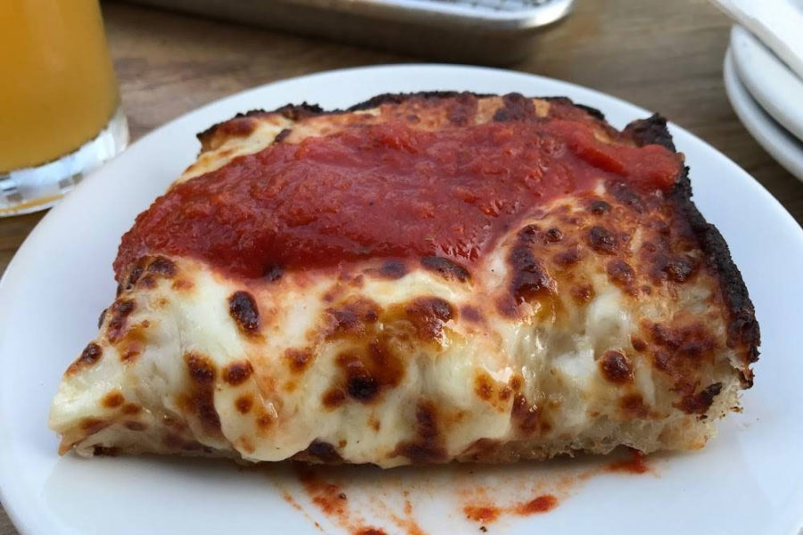 cheesey bread topped with marinara from red light bar detriot pizza in DC