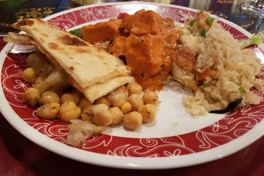 fried rice, butter chicken, naan, and chickpeas from taj indian cuisine in tampa