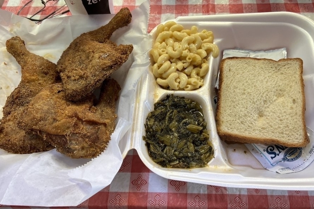 fried chicken wings, collard greens, mac and cheese, bread from Swirk Soul Food in Denver