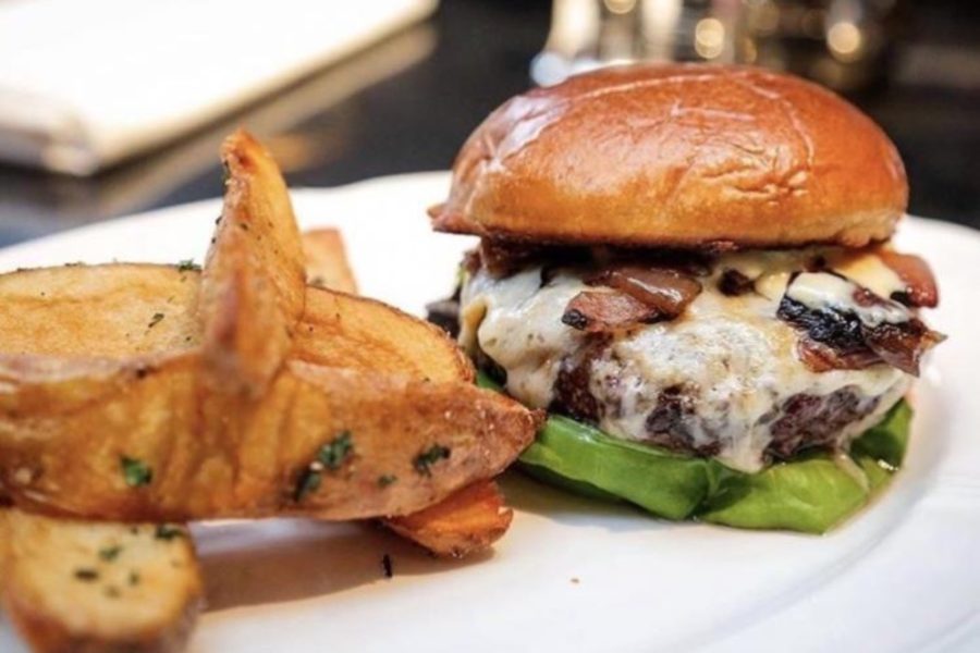 Swiss cheese and mushroom burger with fries from Repeal Oak