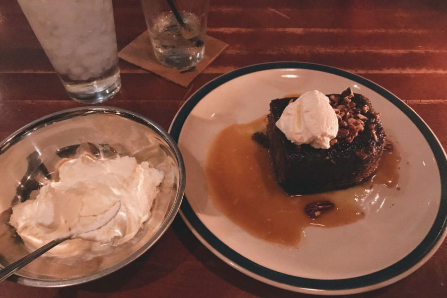 A brownie, ice-cream, and whipped cream from Whiskey Cake