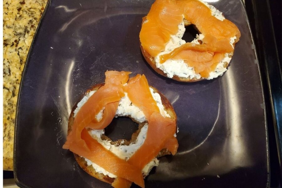 Low carb bagel topped with chive cream cheese & smoked salmon from Sami's Bakery in Tampa