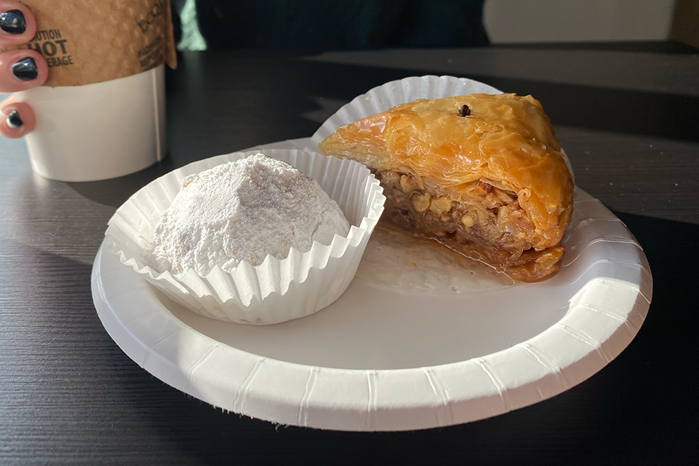 Plate of baklava and sugar-coated wedding cookie