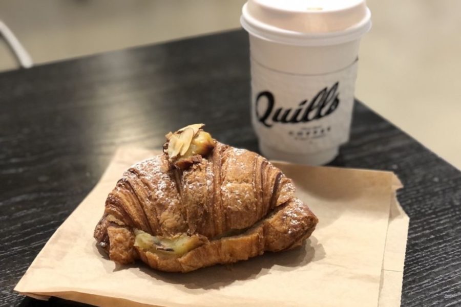 almond croissant and coffee from Quills in Louisville
