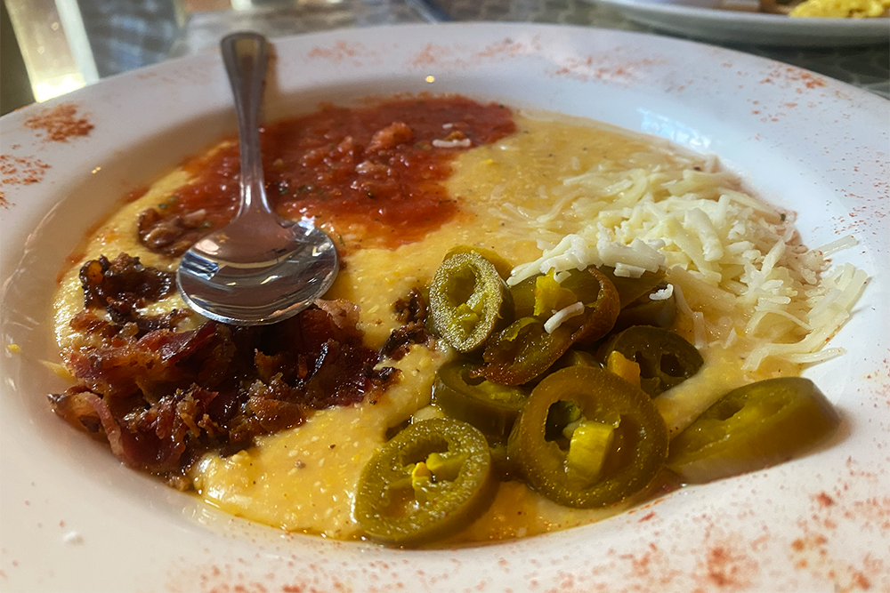 Grits with jalapenos, cheese, bacon, salsa, and more