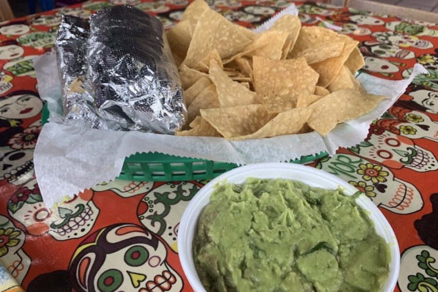 chip and guac with fish tacos from Baja Burrito in Nashville
