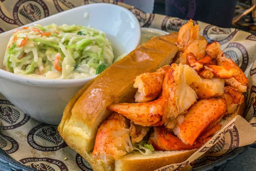 Hot buttered lobster roll with a side of cole slaw from The Lobster Trap