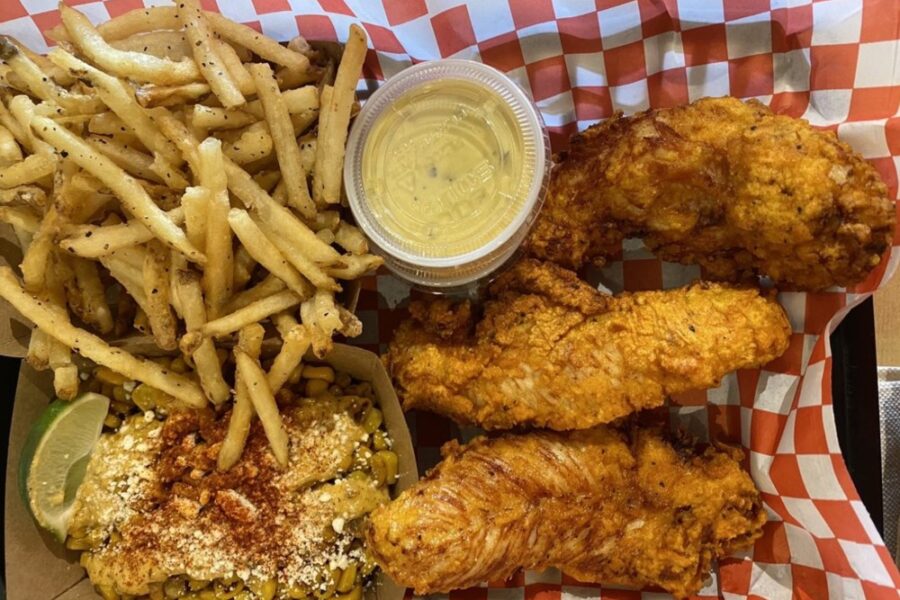 chicken tenders with corn and fries from Kickin Chicken in Charleston