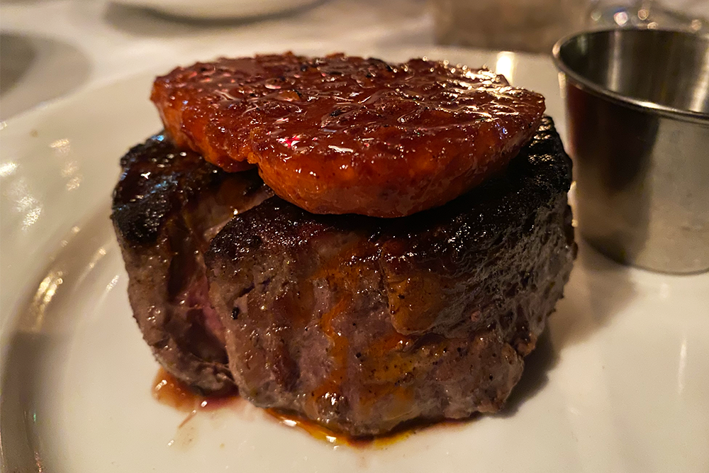 Filet with red chili crisp butter on top of it