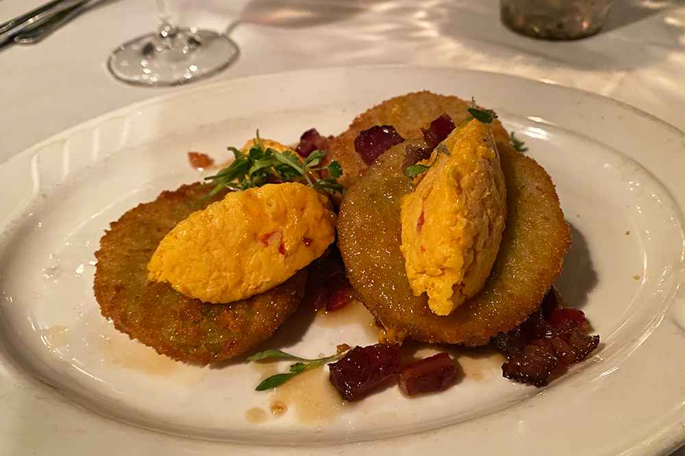 Fried green tomatoes with pimento cheese on top