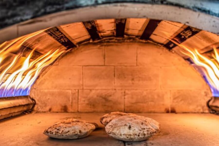 inside the oven at Almanqal Mediterranean Grill in Seattle