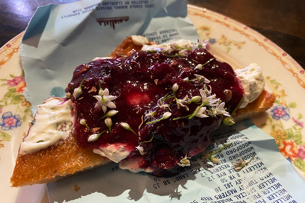 Blueberry jam on a slice of hearty bread