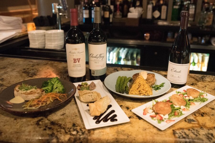 multiple dishes at at the bar at mystic fish in Tampa Florida